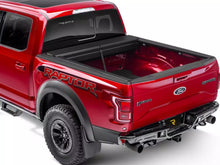 Load image into Gallery viewer, RealTruck Roll-N-Lock M-Series Manual Retractable Tonneau Cover Silverado Sierra 2500/3500HD