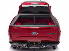Load image into Gallery viewer, RealTruck Roll-N-Lock M-Series Manual Retractable Tonneau Cover Silverado Sierra 2500/3500HD