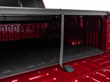 Load image into Gallery viewer, RealTruck Roll-N-Lock M-Series Manual Retractable Tonneau Cover Silverado Sierra 2500/3500HD