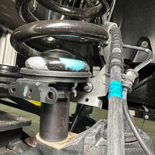 Load image into Gallery viewer, Adjustable Coil Levelers 0-2.5", 2005+ Ford Super Duty
